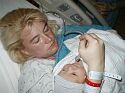 Oxygen tube held near her face.